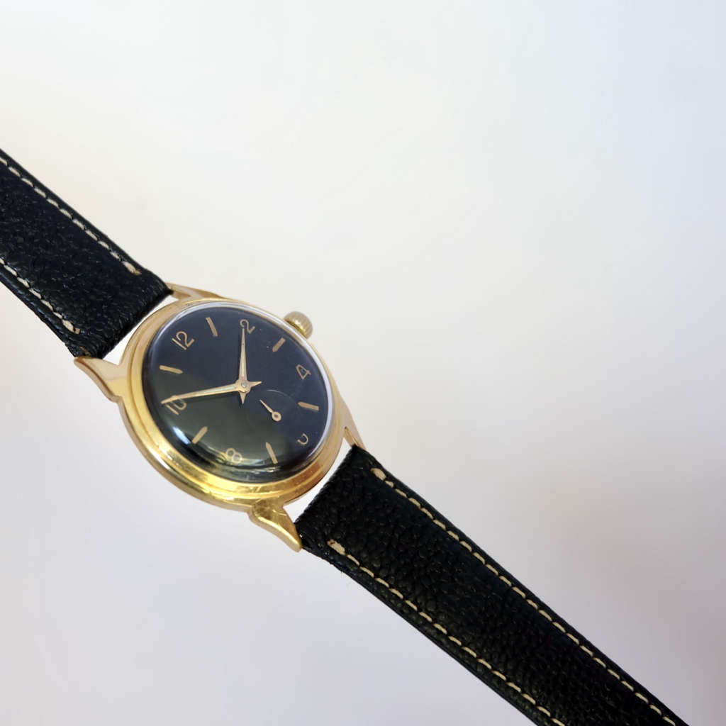 Montre ronde vintage cadran noir