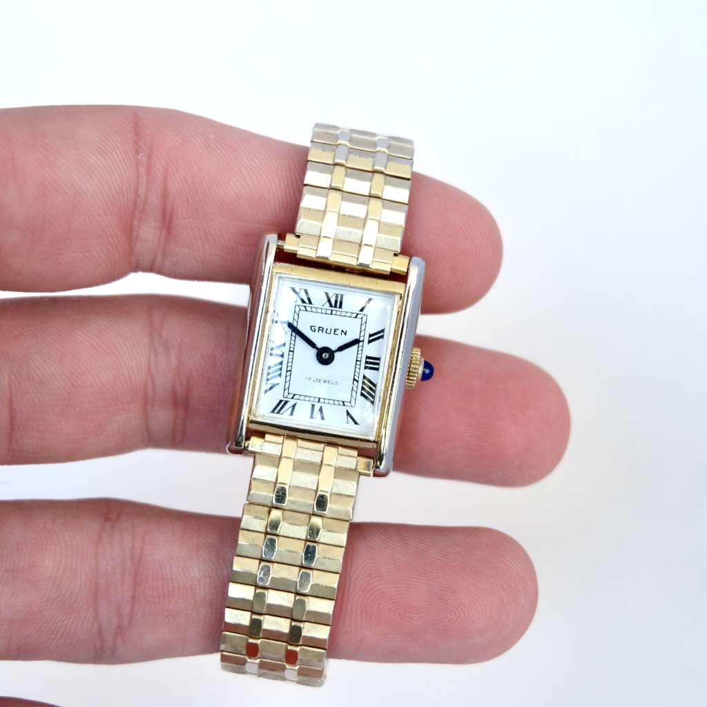 Jolie montre vintage mécanique Gruen femme style Cartier tank or bracelet or Jolie montre vintage mécanique Gruen femme style Cartier tank or bracelet or