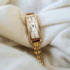 Longue montre femme dorée vintage