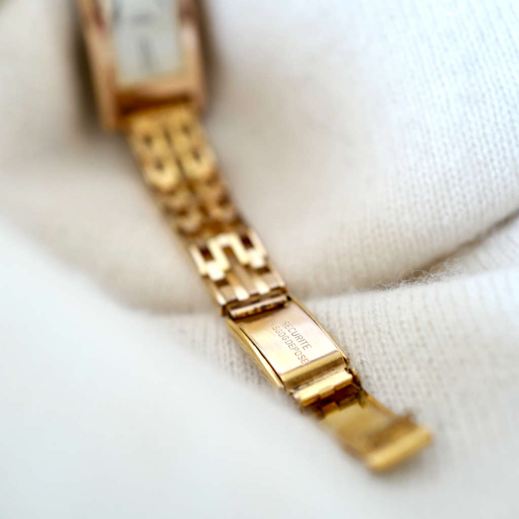 Montre bracelet vintage or doré
