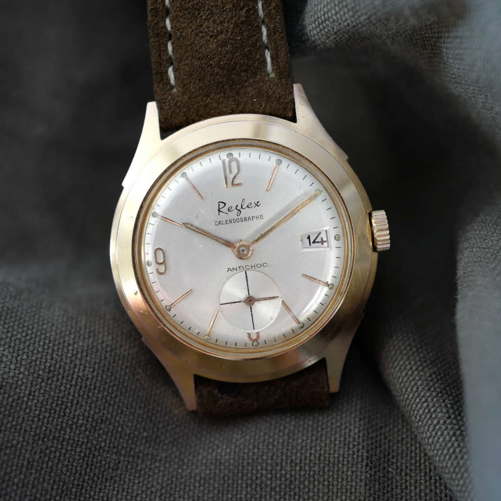 Montre doré plaquée or date mécanisme