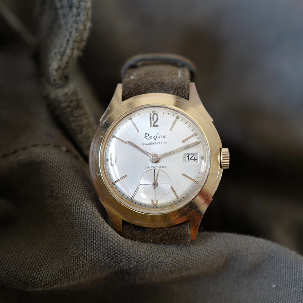 Montre femme or plaquée bracelet bleu date