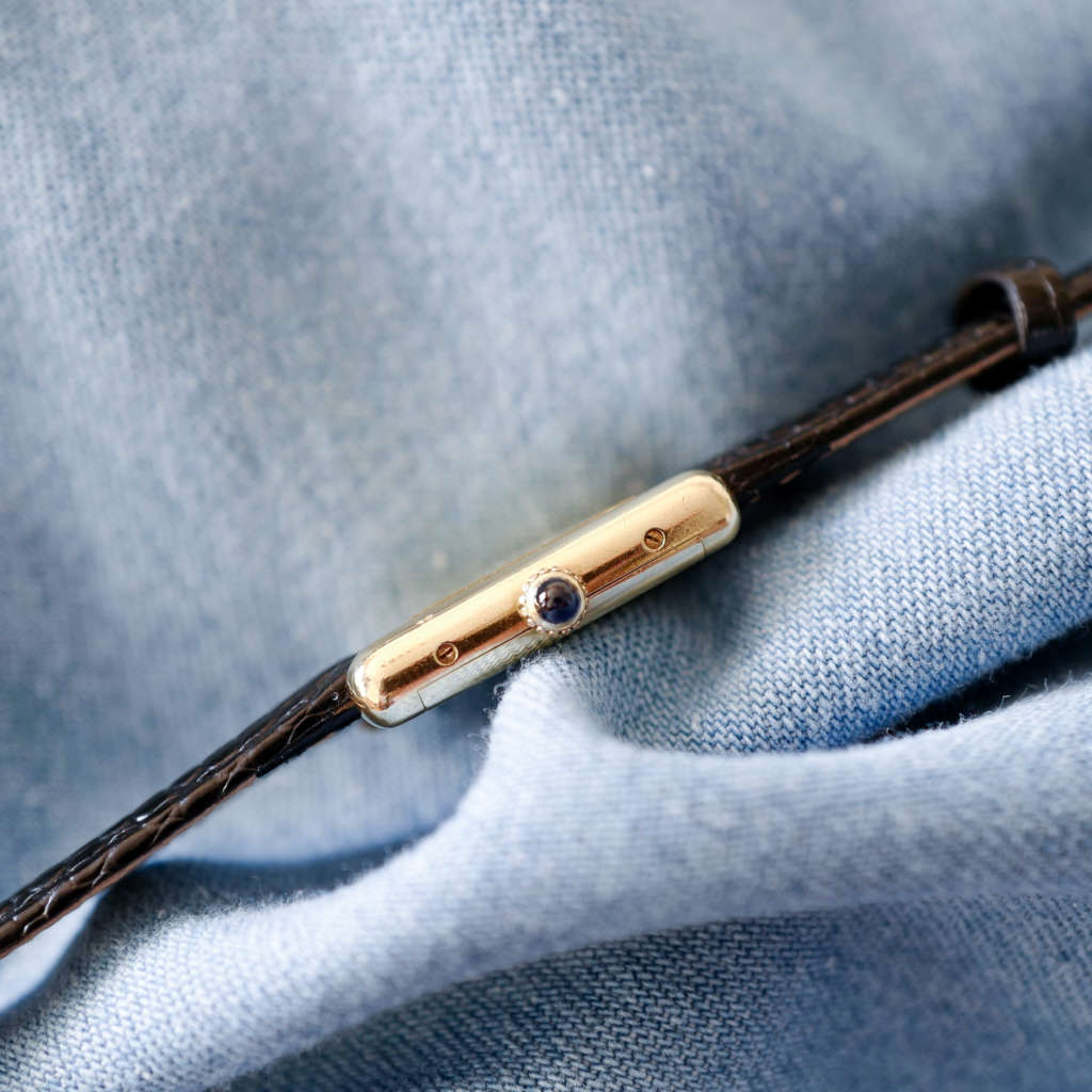 Cartier tank mécanique vintage femme dorée cuir noir