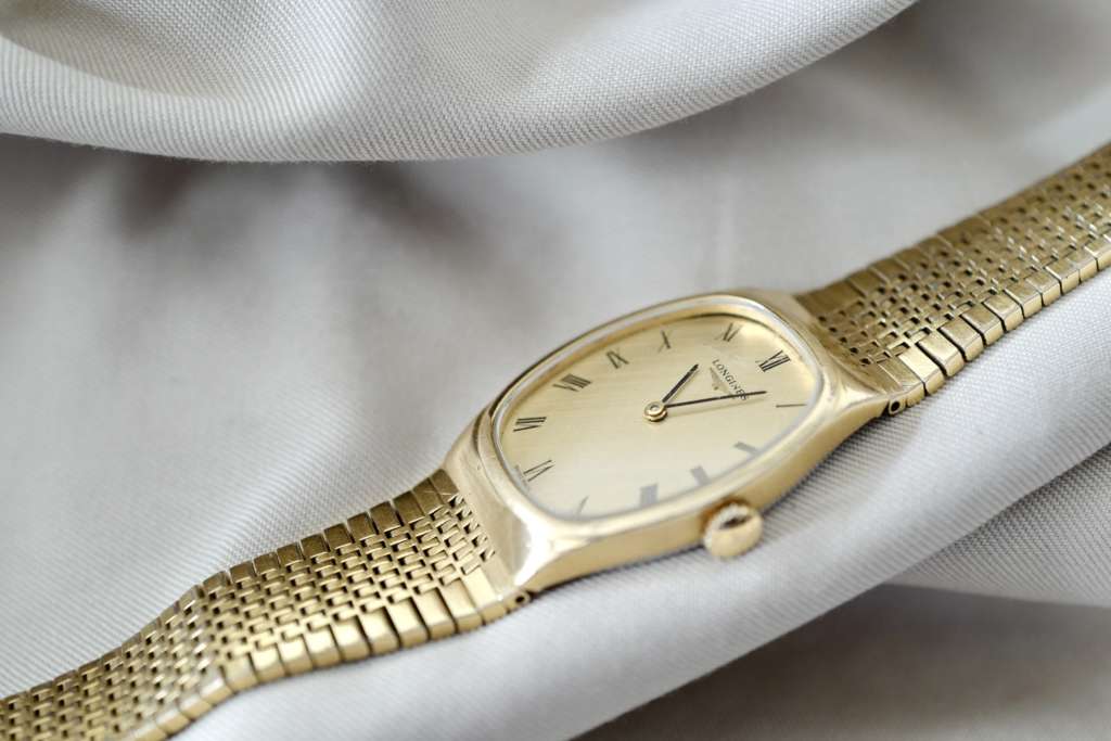 Longines dorée vintage cafe noir les montres