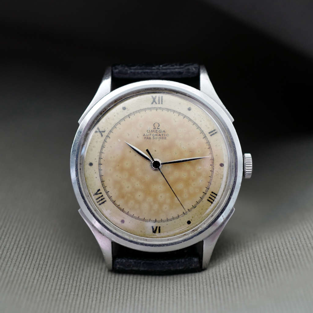 Omega vintage jolie patine