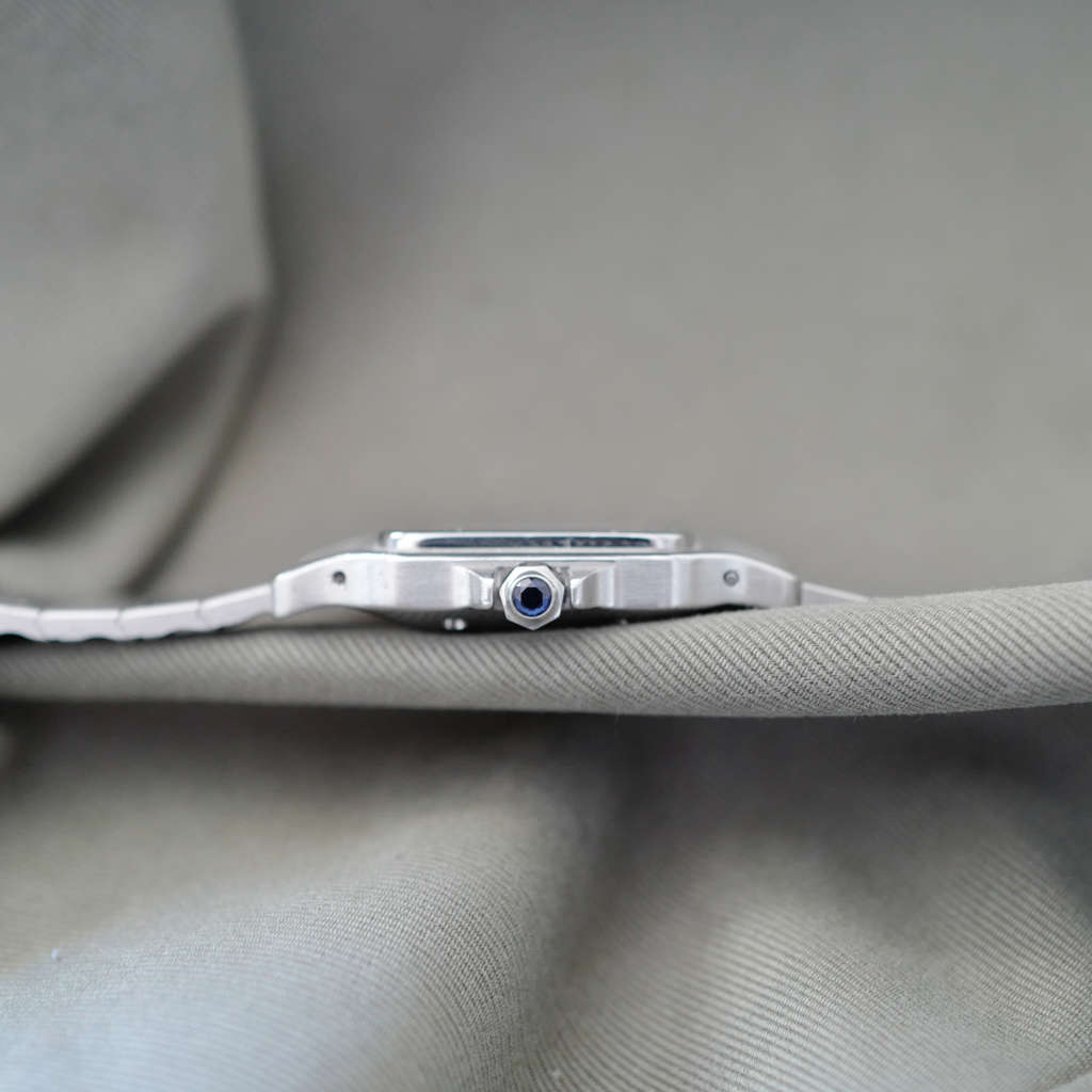 Cartier Santos vintage homme acier cabochon bleu cadran blanc