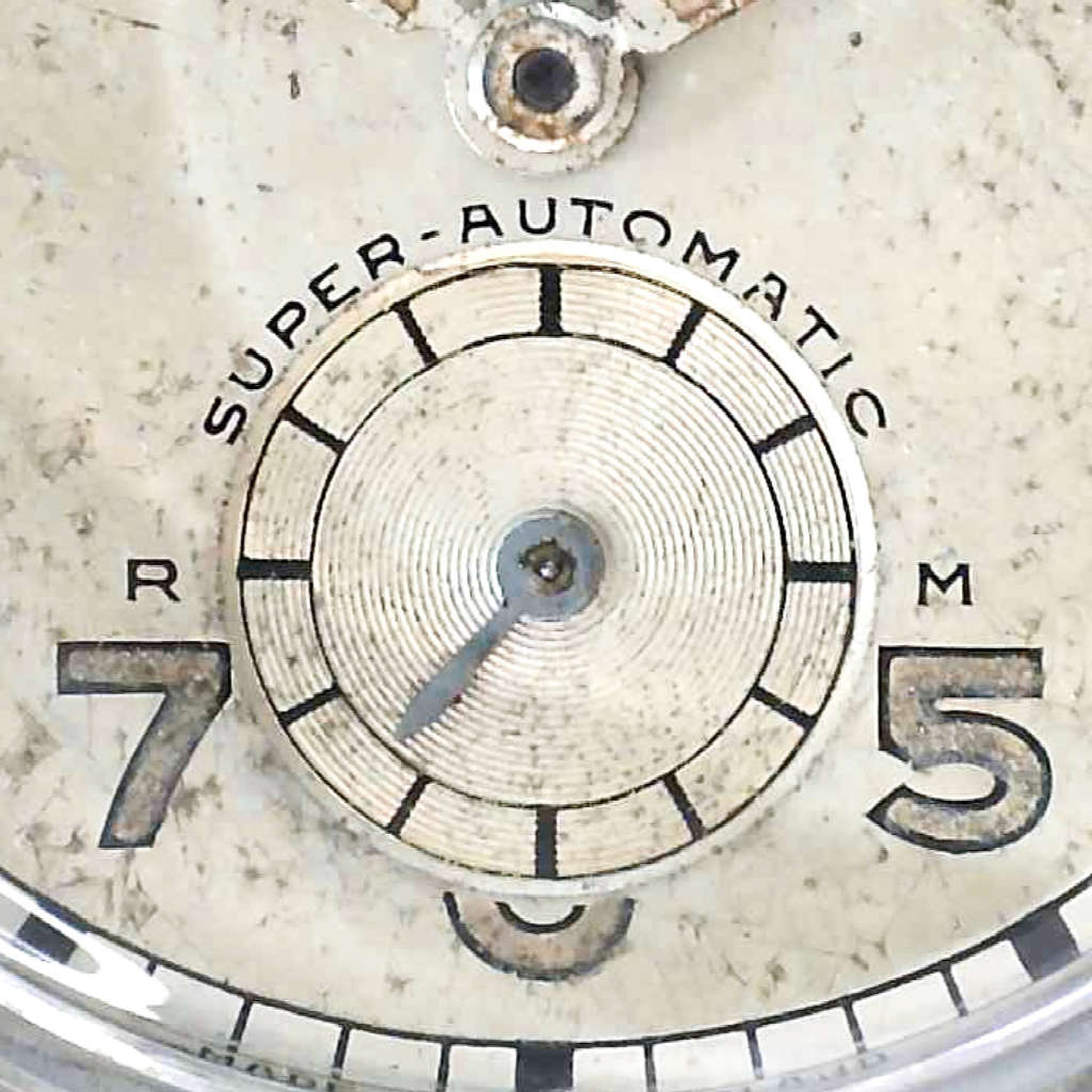 Montre vintage Mido multifort bumper