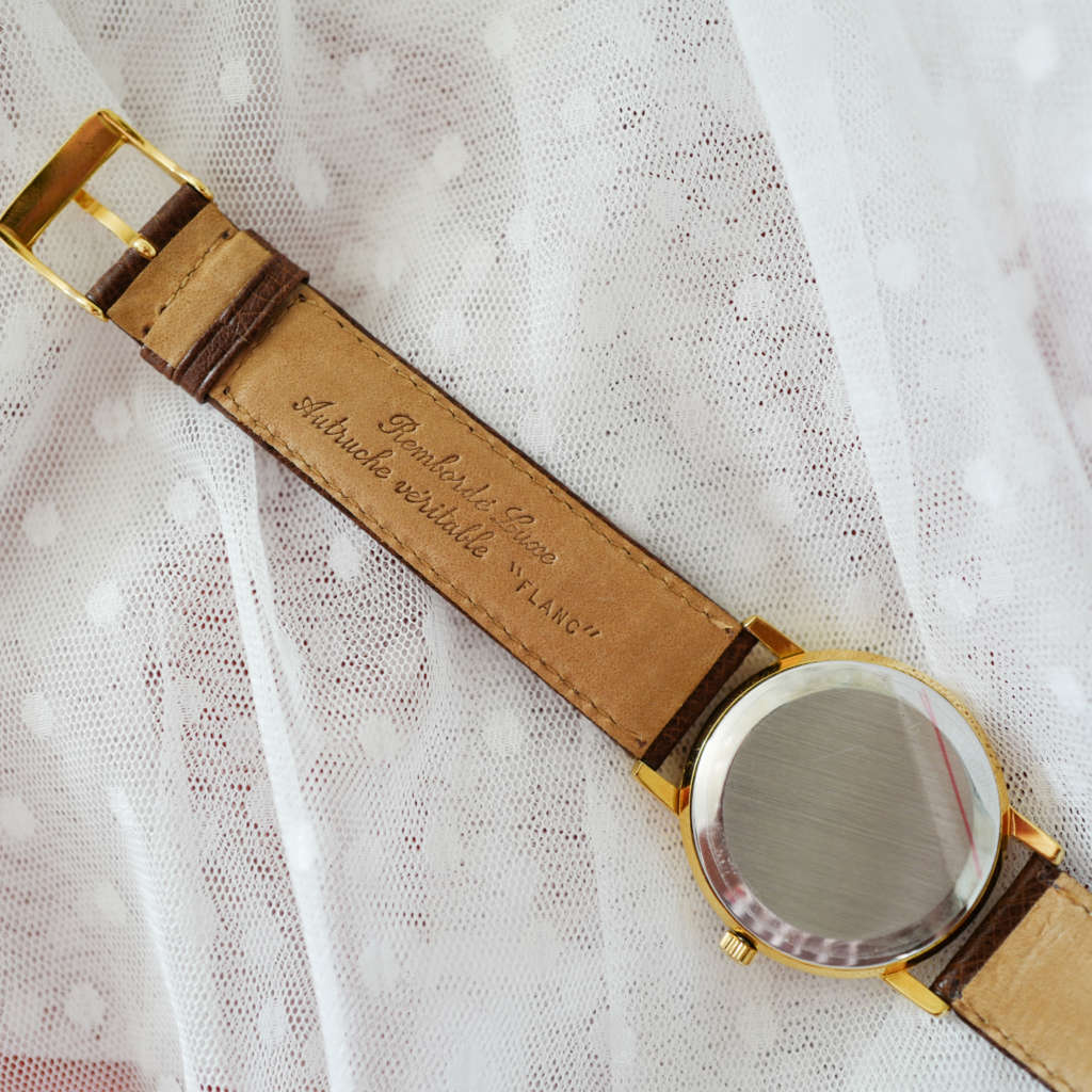 Omega vintage dorée bracelet marron