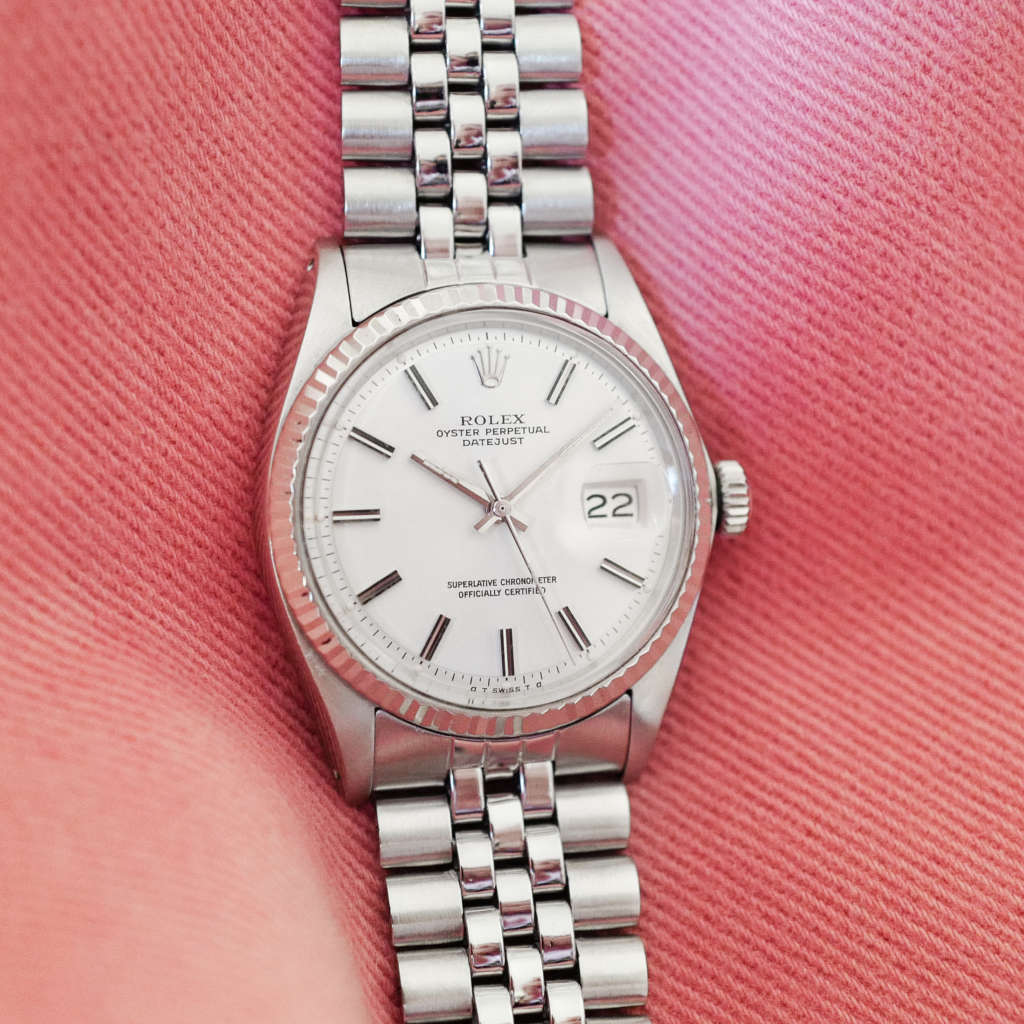 Montre Rolex ancienne 1601 cadran blanc jubilee cannelée