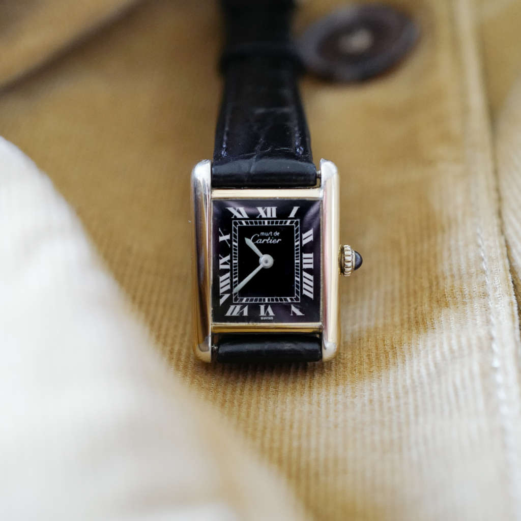 Or cadran noir dorée vintage Cartier femme Or cadran noir dorée vintage Cartier femme
