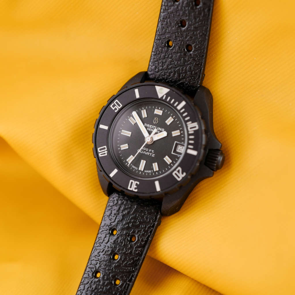 Montre vintage Breitling ancienne PVD noire