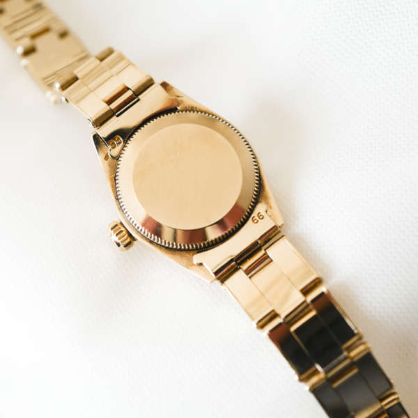 Jolie petite montre or femme Oyster Perpetual 6718 Rolex