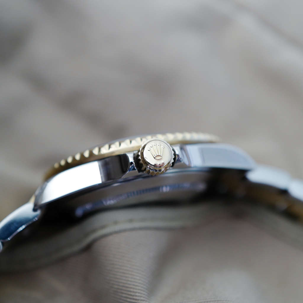 jolie montre vintage 2008 submariner or acier