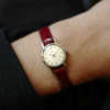 Mini montre ancienne Tissot femme bracelet rouge
