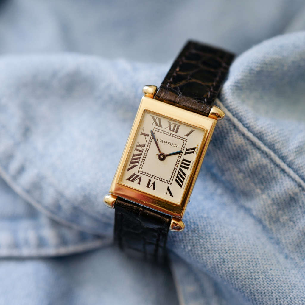 Montre Cartier Tank obus chiffre romain rare or jaune