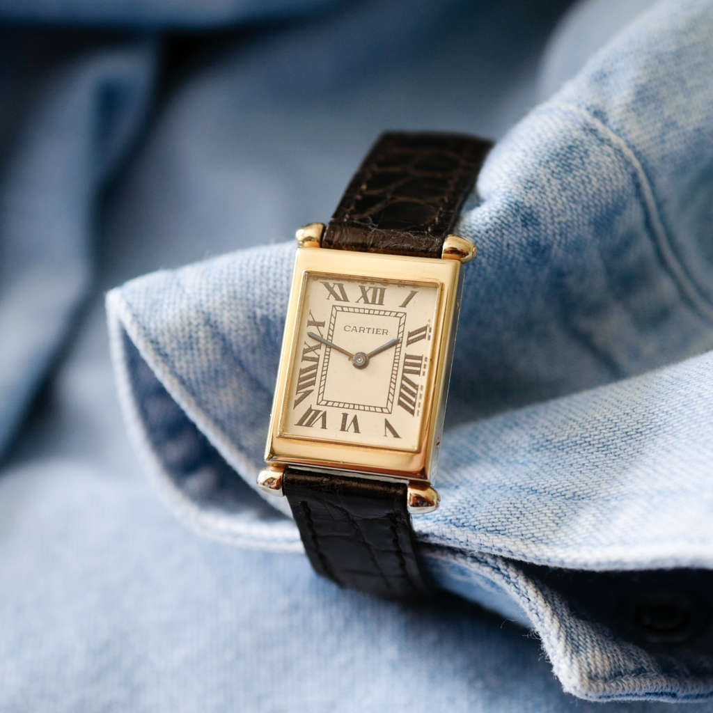 Montre Cartier Tank Obus en or jaune vintage