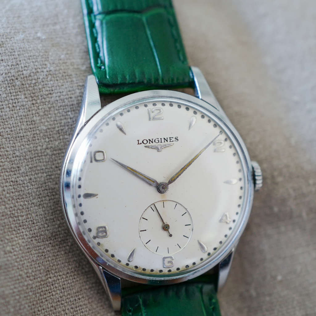 Jolie montre Longines vintage costume extra plate Jolie montre Longines vintage costume extra plate