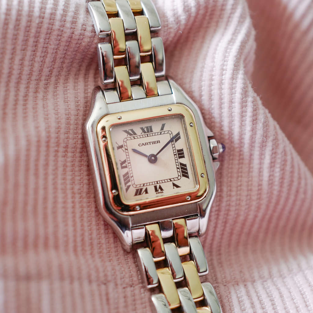 Jolie montre Cartier vintage panthère or et acier