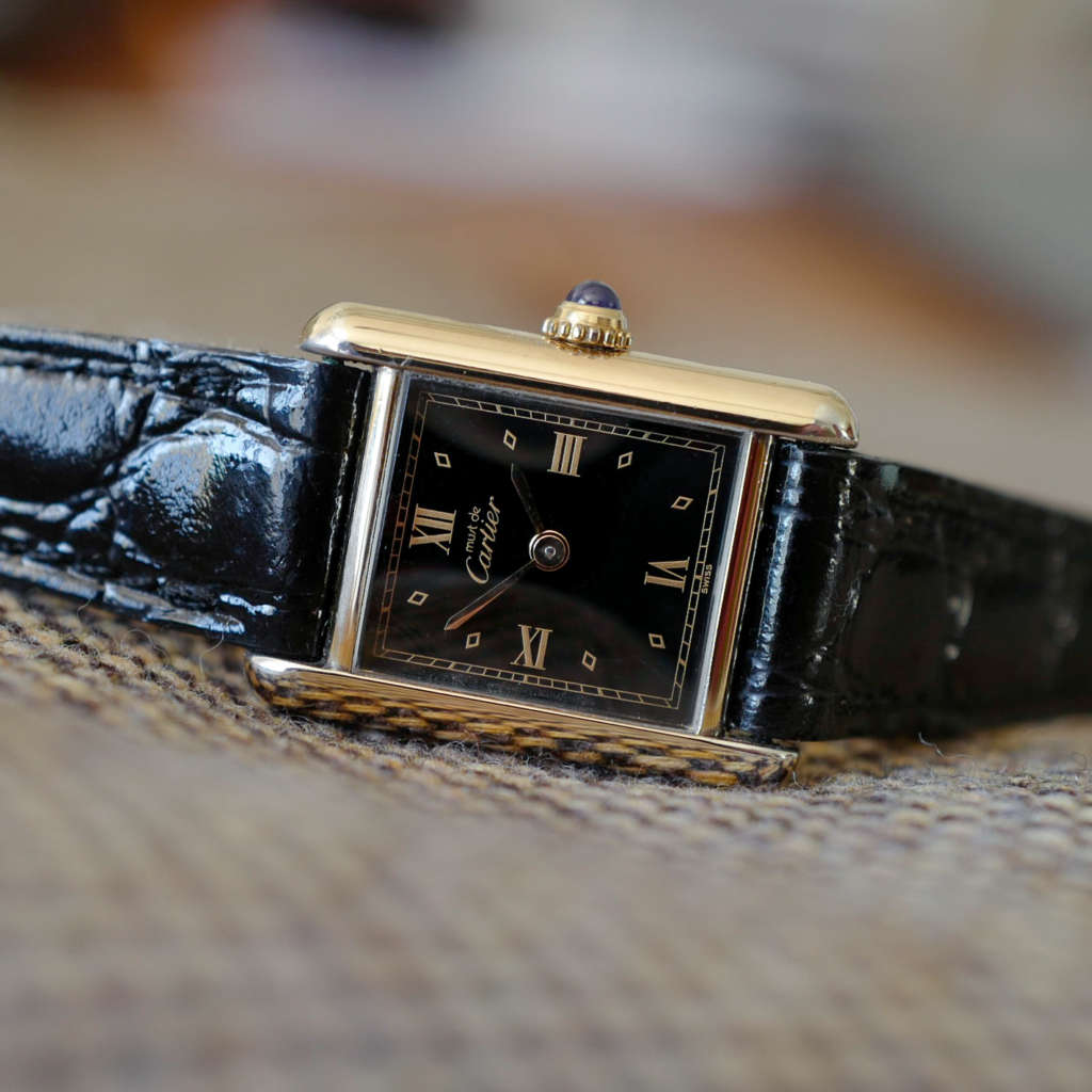 montre cartier tank femme cadran noir