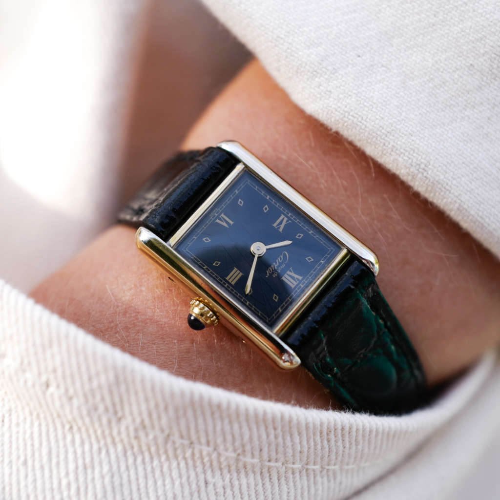 montre cartier tank must femme vintage cadran noir