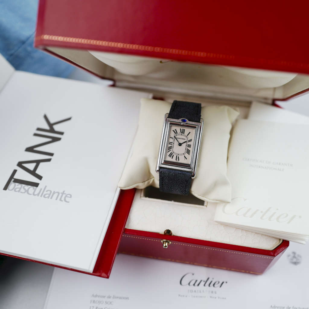 cafe noir montres cartier tank basculante mécanique grand modèle déployante ref 2390