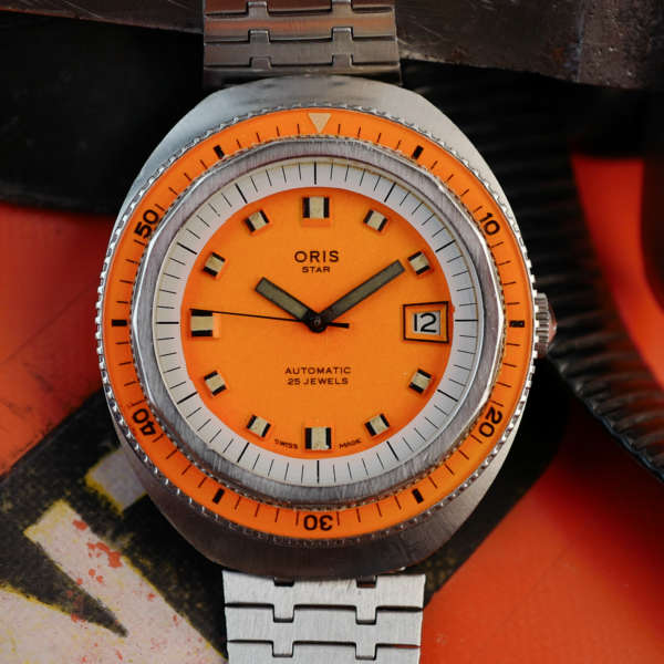 cafe noir les montres oris star montre rare de plongée années 1970 orange vif bakelite verre saphir 60 atmos squale_1