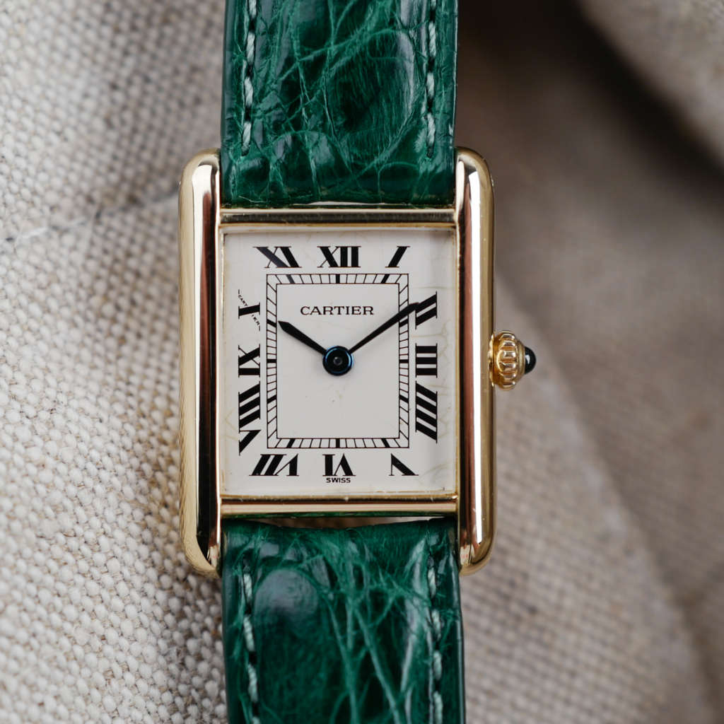 cafe noir montres horloger marseille cartier tank louis petit modèle or massif quartz 18k