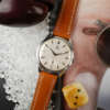 cafe noir les montres vintage horloger marseille montre omega oversize jumbo 2505-1 1939 annee 1940 cadran blanc 38 mm bracelet marron beige