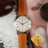 cafe noir les montres vintage horloger marseille montre omega oversize jumbo 2505-1 1939 annee 1940 cadran blanc 38 mm bracelet marron beige