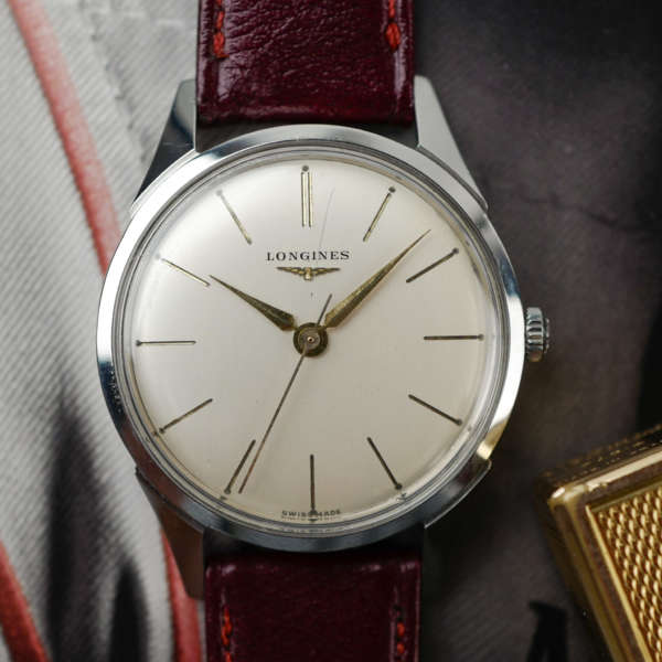 extra fine cafe noir les montres vintage horloger marseille montres vintage LONGINES Calatrava 7158 acier cadran blanc 1960