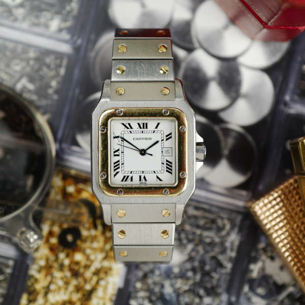 cafe noir les montres vintage horloger marseille cartier santos or et acier grand modele taille homme vintage or et acier
