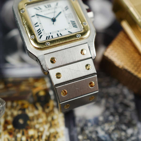 cafe noir les montres vintage horloger marseille cartier santos or et acier grand modele taille homme vintage or et acier