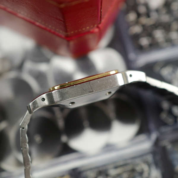 cafe noir les montres vintage horloger marseille cartier santos or et acier grand modele taille homme vintage or et acier