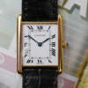 cafe noir les montres horloger marseille cartier tank or jaune 18k Collection Louis Medium M2000 vintage 1990