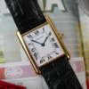 cafe noir les montres horloger marseille cartier tank or jaune 18k Collection Louis Medium M2000 vintage 1990