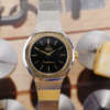 cafe noir les montres vintage omega constellation femme or acier 595 0001 795 0800 cadran noir bicolor 28 mm mini 1977