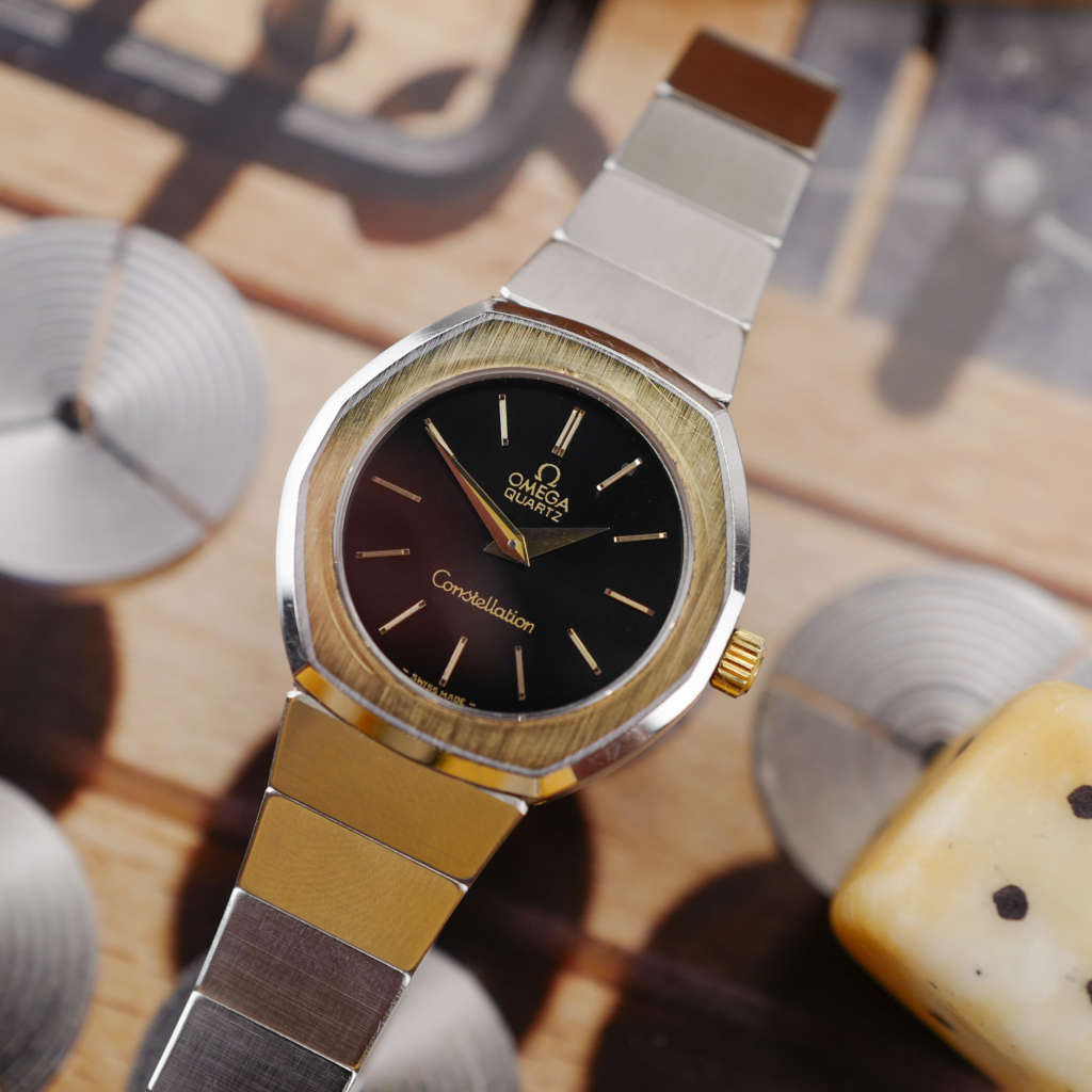 cafe noir les montres vintage omega constellation femme or acier 595 0001 795 0800 cadran noir bicolor 28 mm mini 1977_4 cafe noir les montres vintage omega constellation femme or acier 595 0001 795 0800 cadran noir bicolor 28 mm mini 1977