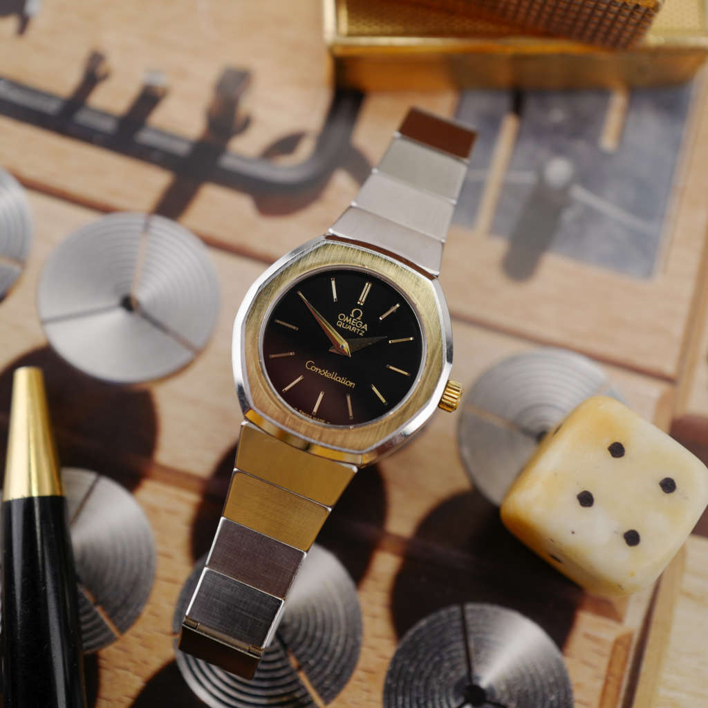cafe noir les montres vintage omega constellation femme or acier 595 0001 795 0800 cadran noir bicolor 28 mm mini 1977