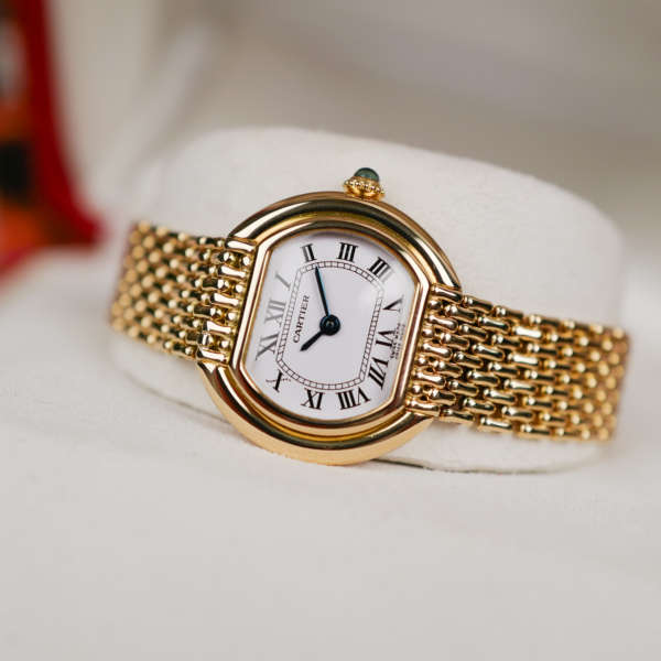 Café Noir Les Montres Marseille Cartier Ellipse femme réf. 67081 bracelet en maille en or jaune 18 carats vintage 1970 investissement