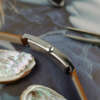 cafe noir montres horloger marseille montre Sally vintage tank cintrée atypique rectangle cadran bleu mécanique manuelle