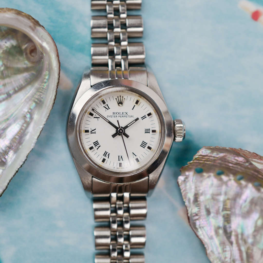 cafe noir les montres horloger marseille rolex femme 26 mm petit modele bracelet jubilee lunette cannelee Oyster Perpetual 6718 jubilee chiffres romain tritium femme_1 cafe noir les montres horloger marseille rolex femme 26 mm petit modele bracelet jubilee lunette cannelee Oyster Perpetual 6718 jubilee chiffres romain tritium femme romains