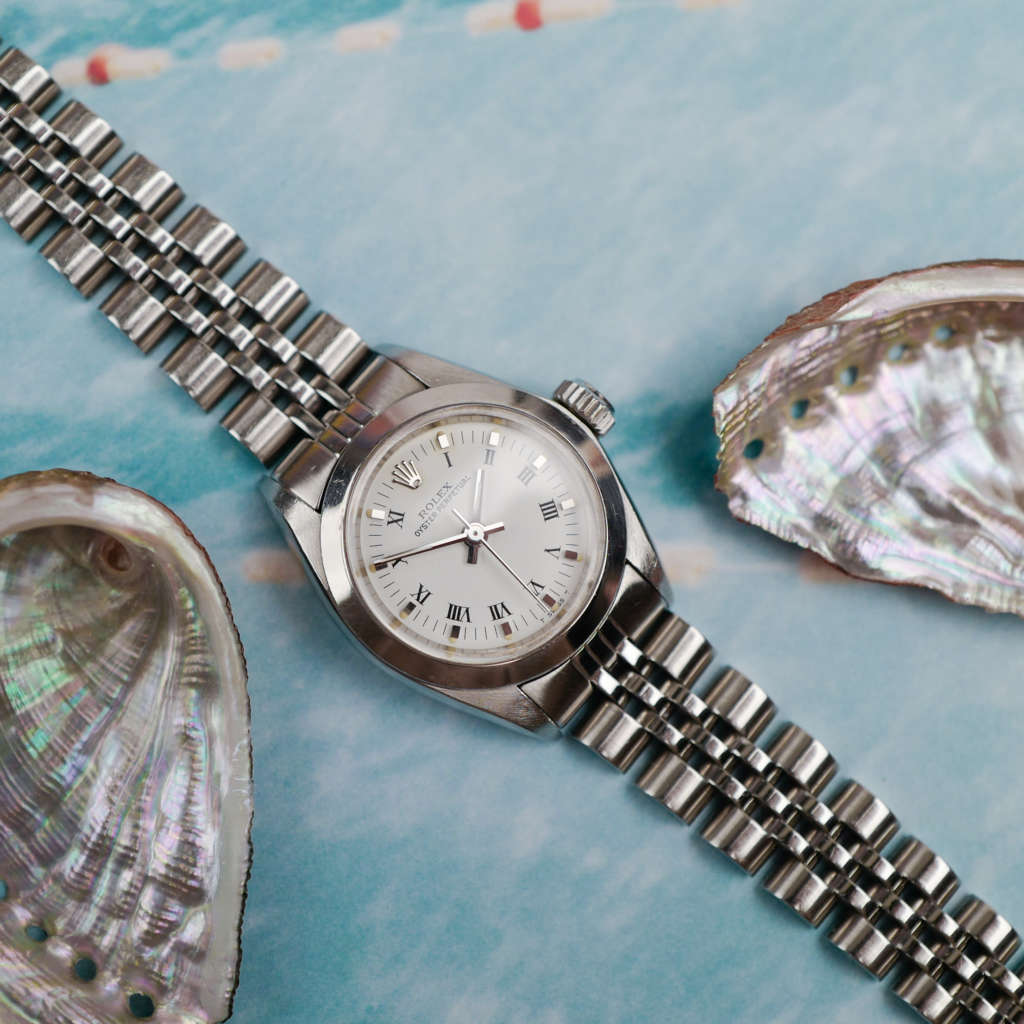 cafe noir les montres horloger marseille rolex femme 26 mm petit modele bracelet jubilee lunette cannelee Oyster Perpetual 6718 jubilee chiffres romain tritium femme_3 cafe noir les montres horloger marseille rolex femme 26 mm petit modele bracelet jubilee lunette cannelee Oyster Perpetual 6718 jubilee chiffres romain tritium femme romains