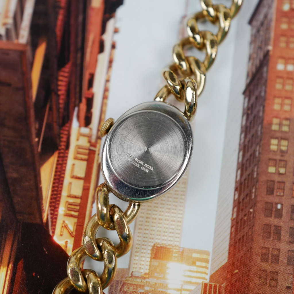 cafe-noir-les-montres-horlogerie-vendeur-marseille-timex-montre-gourmette-bracelet-vintage-mecanique