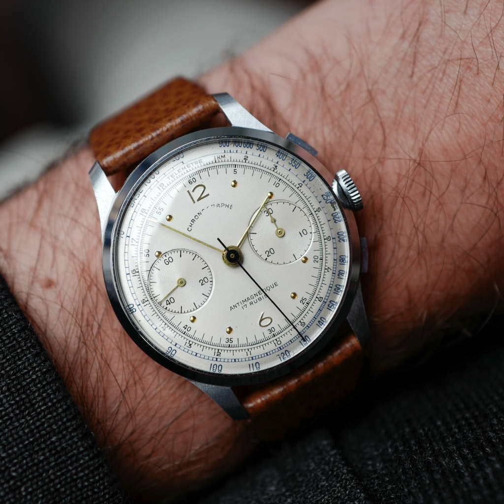 cafe noir les montres vintage horloger marseille montres chronographe suisse acier nos telemetre tachymetre cadran blanc landeron 148 mecanique manuel 1950