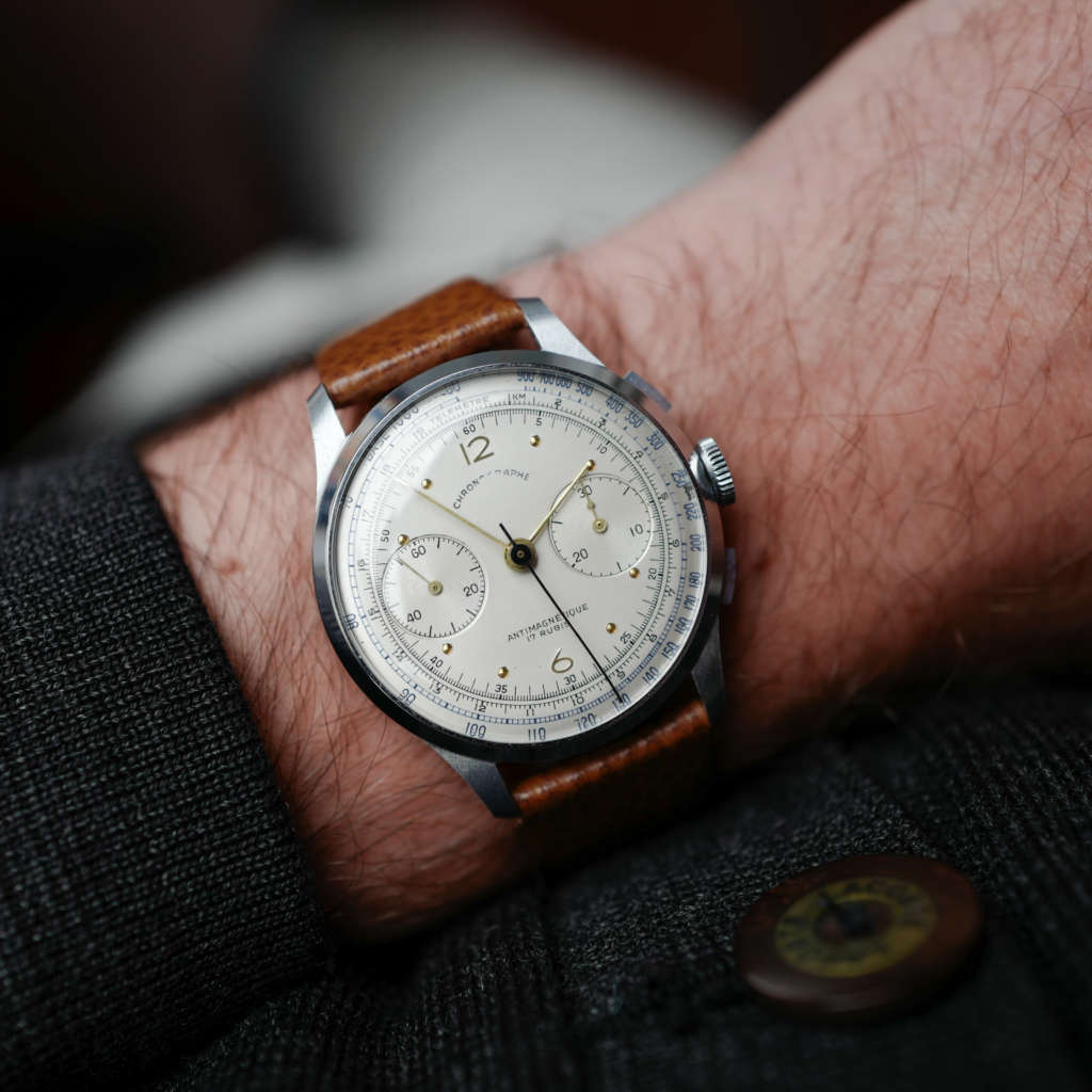 cafe noir les montres vintage horloger marseille montres chronographe suisse acier nos telemetre tachymetre cadran blanc landeron 148 mecanique manuel 1950