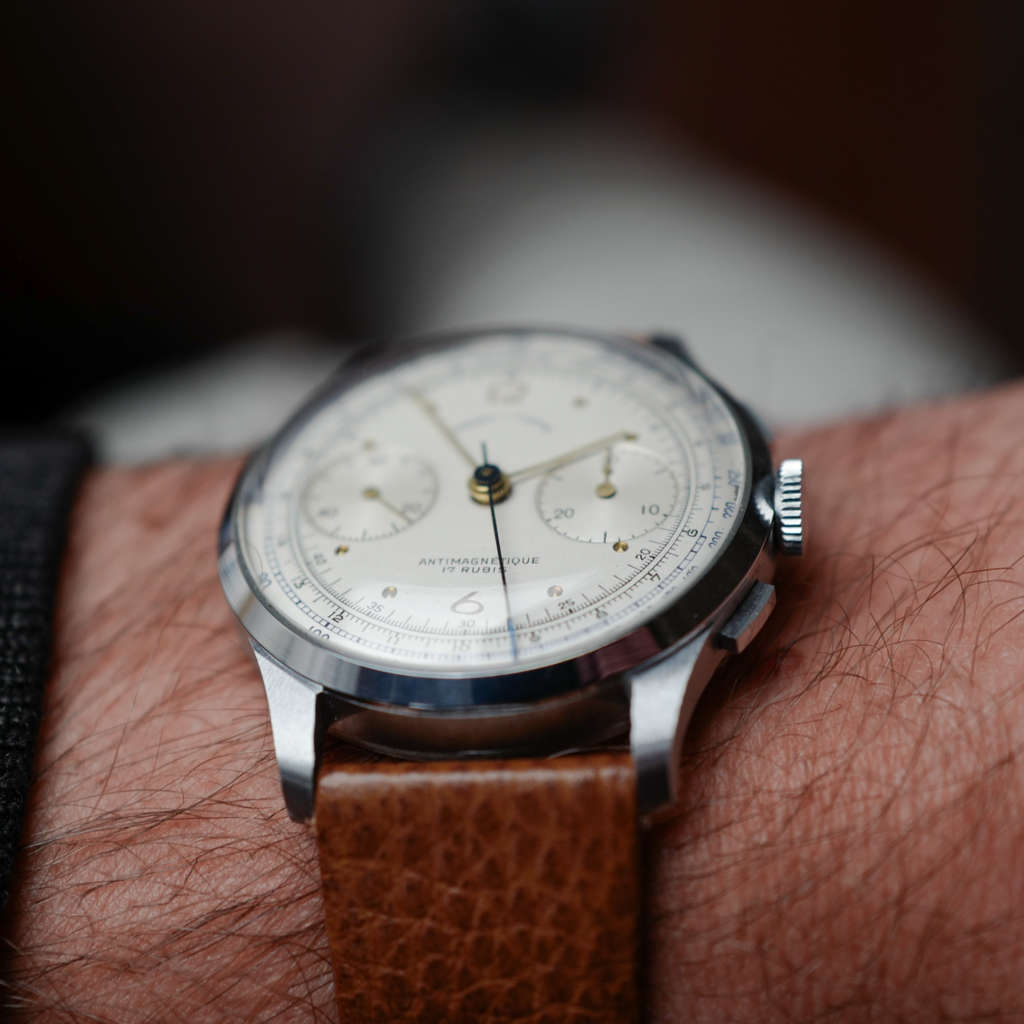 cafe noir les montres vintage horloger marseille montres chronographe suisse acier nos telemetre tachymetre cadran blanc landeron 148 mecanique manuel 1950