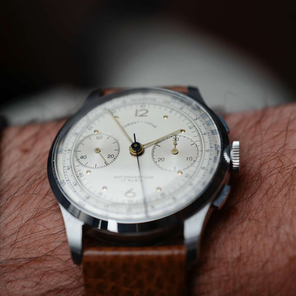 cafe noir les montres vintage horloger marseille montres chronographe suisse acier nos telemetre tachymetre cadran blanc landeron 148 mecanique manuel 1950