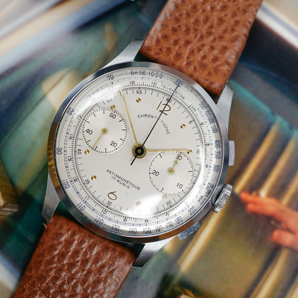 cafe noir les montres vintage horloger marseille montres chronographe suisse acier nos telemetre tachymetre cadran blanc landeron 148 mecanique manuel 1950