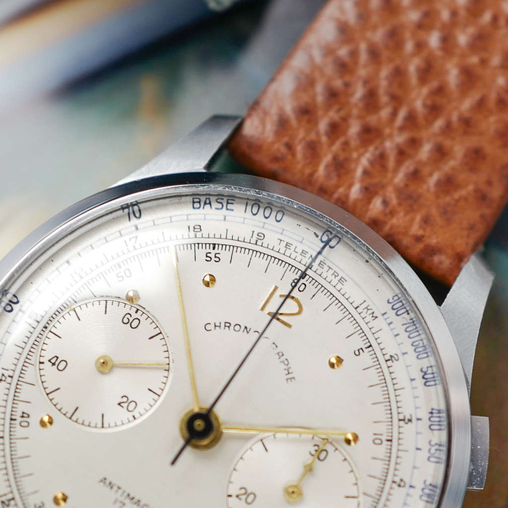 cafe noir les montres vintage horloger marseille montres chronographe suisse acier nos telemetre tachymetre cadran blanc landeron 148 mecanique manuel 1950