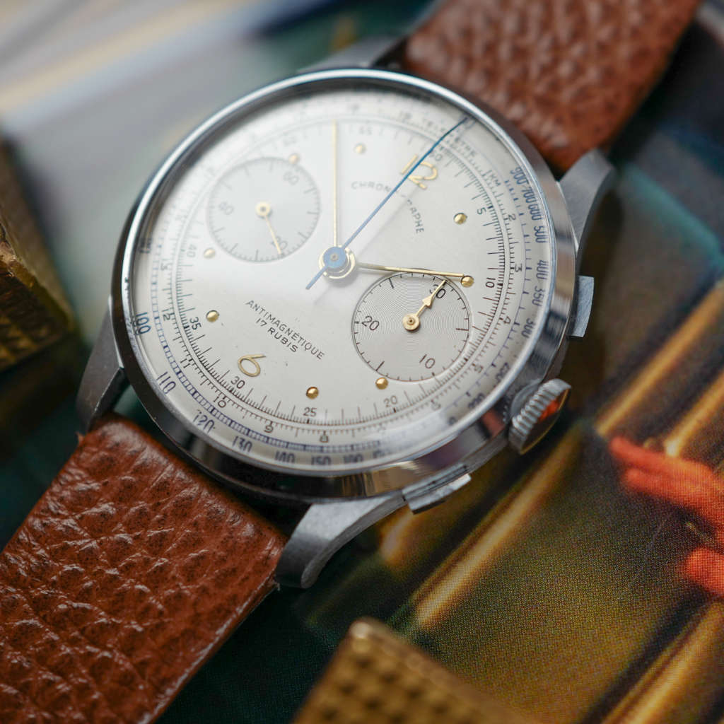 cafe noir les montres vintage horloger marseille montres chronographe suisse acier nos telemetre tachymetre cadran blanc landeron 148 mecanique manuel 1950